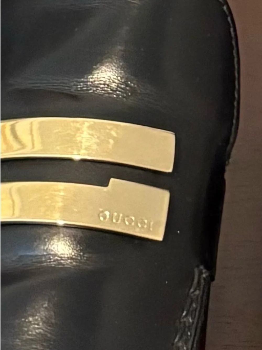 Gucci Black Leather Slip-On Loafers with Gold Plaque